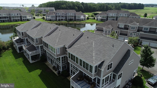 drone / aerial view featuring a water view