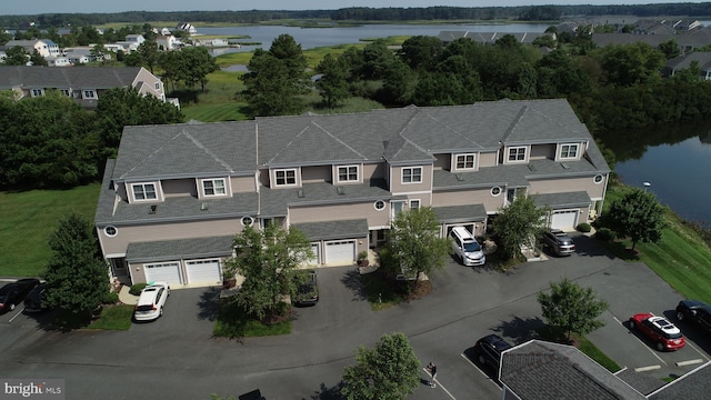 bird's eye view with a water view