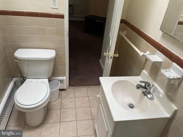 bathroom featuring tile walls, backsplash, vanity, and tile flooring