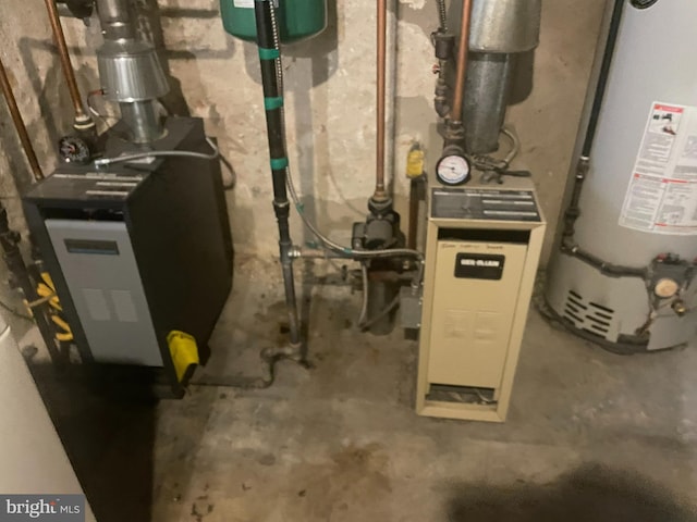 utility room with water heater