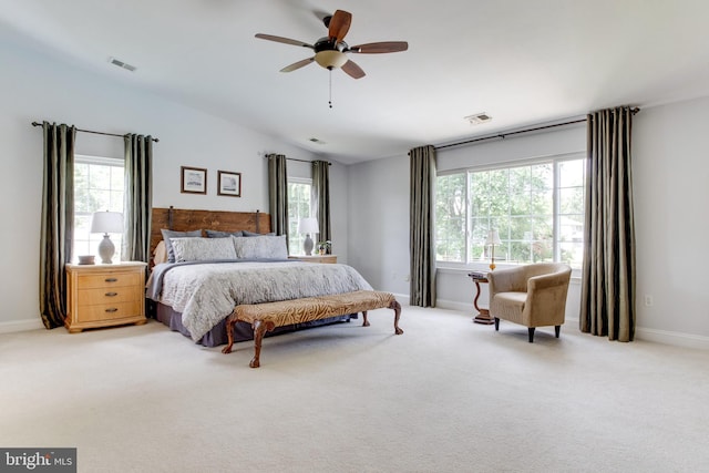 bedroom featuring light carpet and ceiling fan