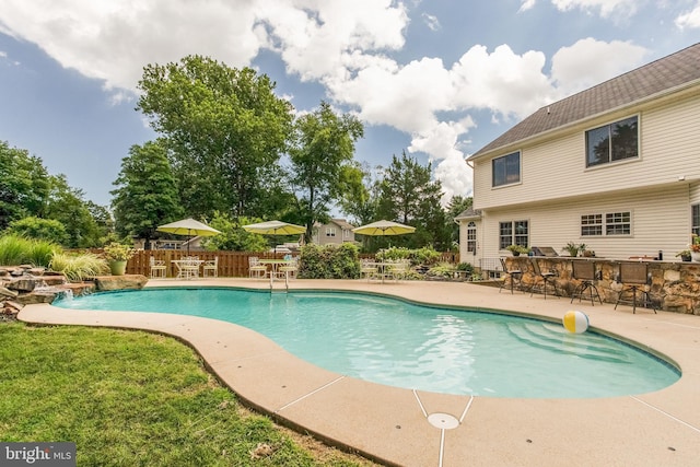 view of pool featuring a patio area