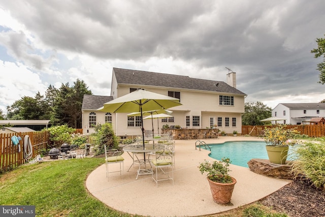 view of pool featuring a patio area