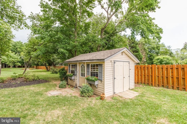 view of outdoor structure with a yard