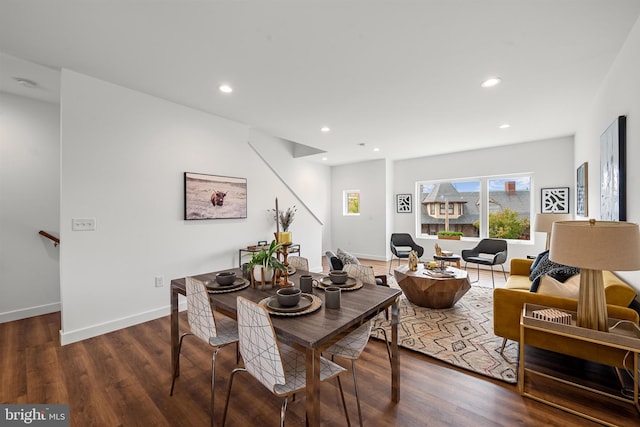 dining area featuring dark hardwood / wood-style flooring