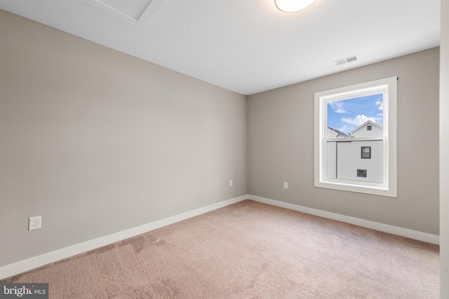 view of carpeted spare room