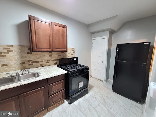 kitchen with tasteful backsplash, light tile floors, sink, dark brown cabinets, and black appliances