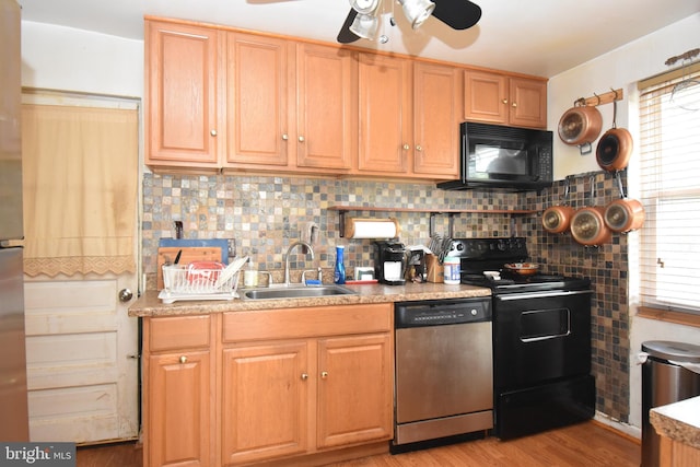 kitchen featuring ceiling fan, electric range, light wood-type flooring, dishwasher, and tasteful backsplash