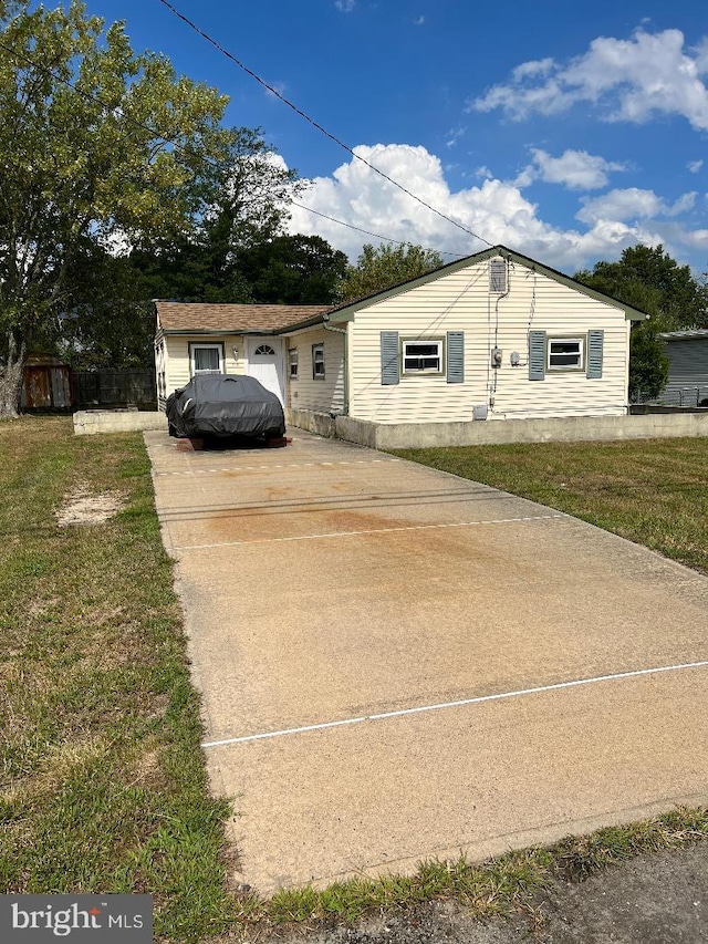 view of front of home with a front yard