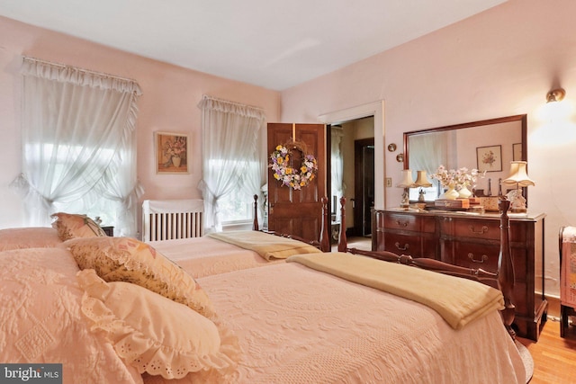 bedroom featuring light hardwood / wood-style floors