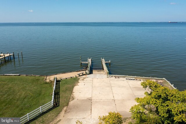 dock area with a water view