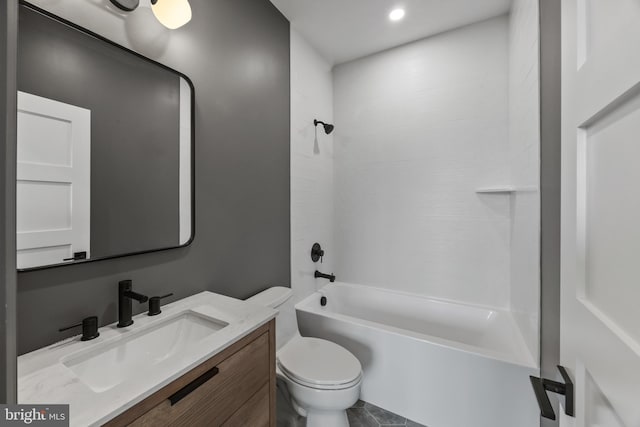 bathroom with toilet, vanity, and shower / bathing tub combination