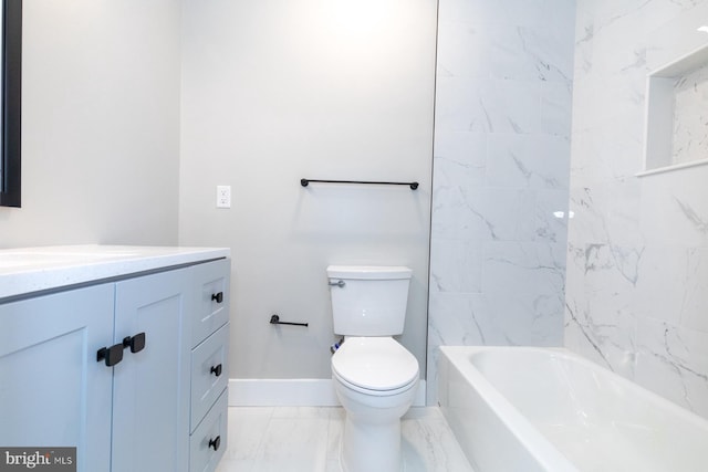 full bathroom featuring toilet, tile floors, tiled shower / bath combo, and vanity