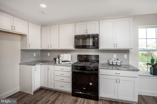 kitchen featuring dark wood-type flooring, white cabinetry, and black appliances