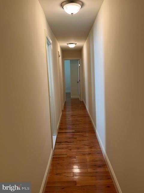 hall featuring dark hardwood / wood-style floors