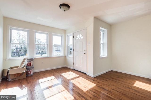 entrance foyer with dark hardwood / wood-style flooring