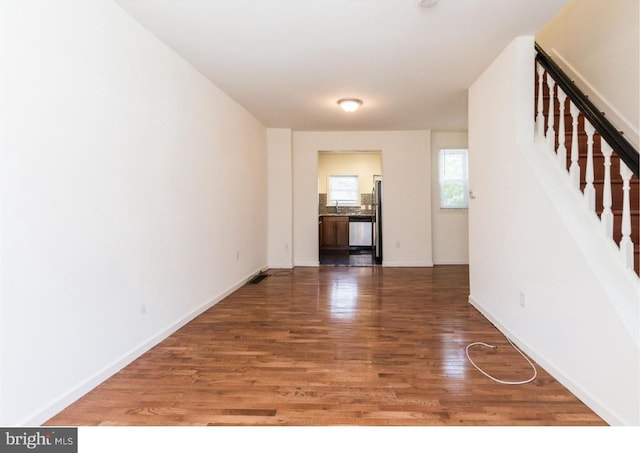 spare room featuring hardwood / wood-style floors