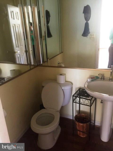 bathroom featuring toilet