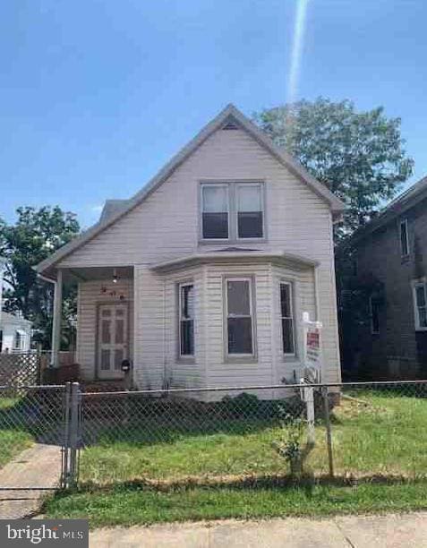 bungalow with a front yard