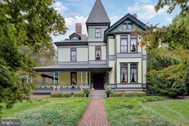 victorian home featuring covered porch