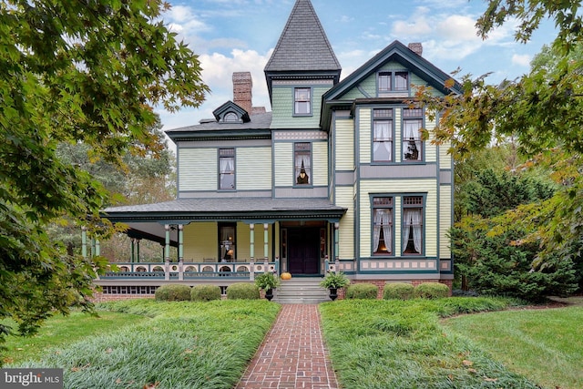 victorian-style house with covered porch