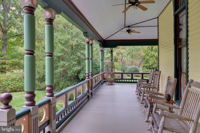 exterior space with ceiling fan and a porch