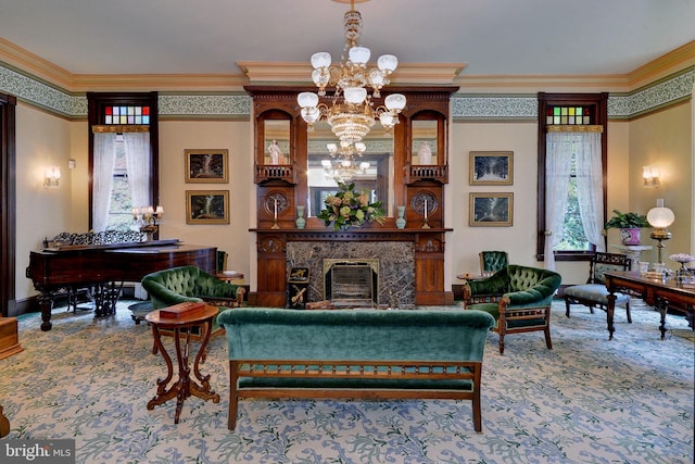 interior space featuring an inviting chandelier, ornamental molding, and a premium fireplace