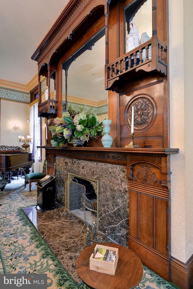 living room with ornamental molding