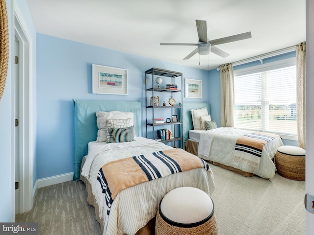 bedroom featuring ceiling fan and carpet flooring