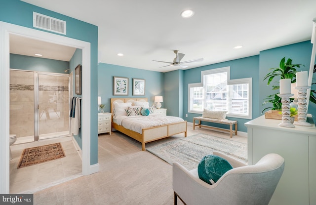 bedroom featuring ceiling fan and light carpet