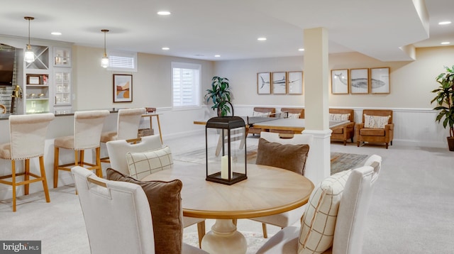 view of carpeted dining space