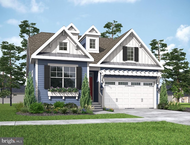 view of front of home with a front lawn and a garage