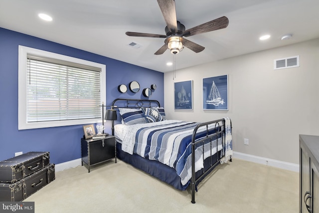 carpeted bedroom featuring ceiling fan