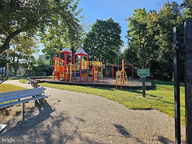 view of play area featuring a lawn