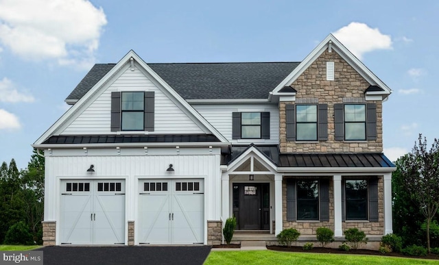 craftsman-style home with a front lawn and a garage