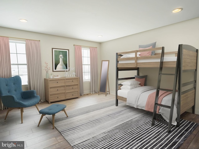 bedroom featuring hardwood / wood-style floors