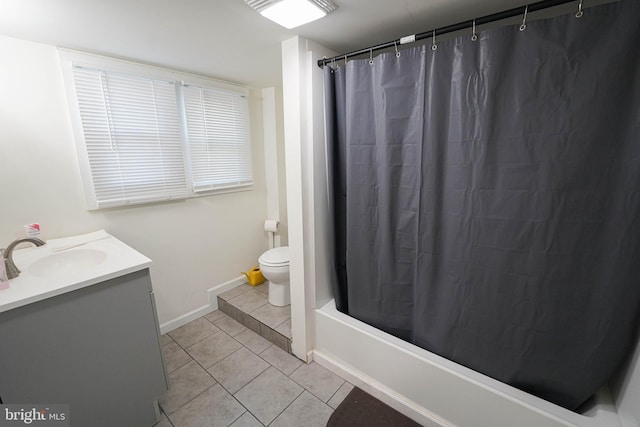 full bathroom with shower / bath combination with curtain, tile floors, toilet, and vanity