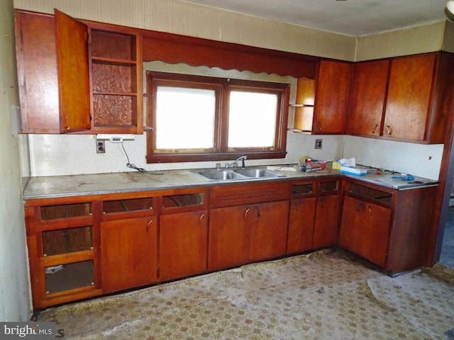 kitchen with backsplash and sink