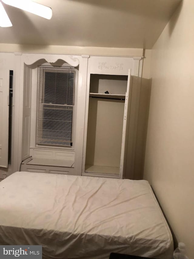 unfurnished bedroom with a closet