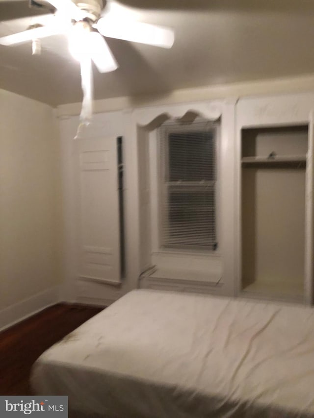 unfurnished bedroom with ceiling fan