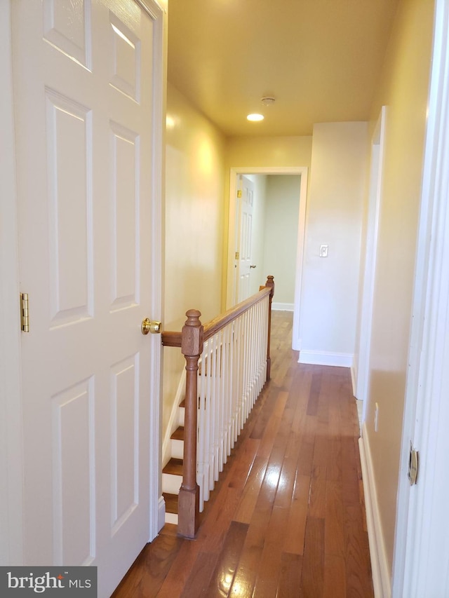 2615 N 12th St, Philadelphia, PA 19133 - hallway with baseboards, an upstairs landing, recessed lighting, and hardwood / wood-style flooring
