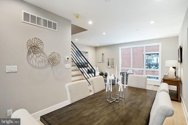 dining space featuring light hardwood / wood-style flooring