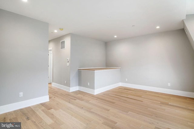 empty room with light wood-type flooring