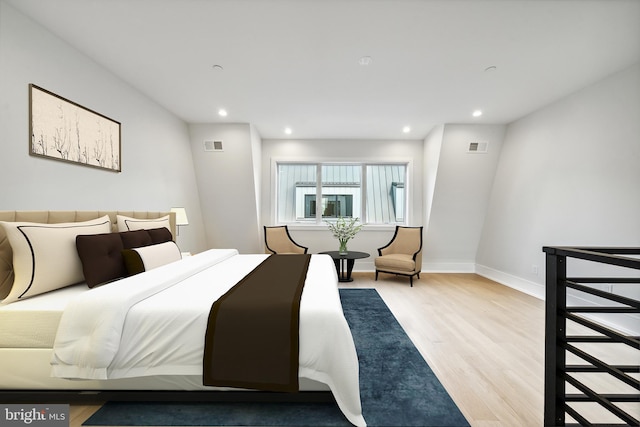 bedroom with light hardwood / wood-style floors