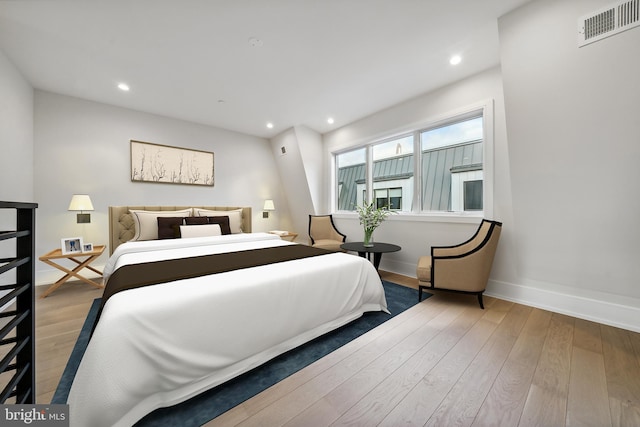 bedroom featuring light hardwood / wood-style flooring