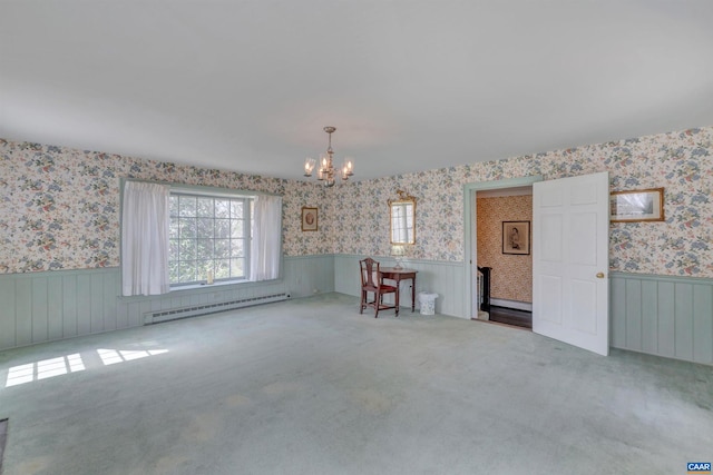 unfurnished dining area with a notable chandelier, a baseboard radiator, and light carpet