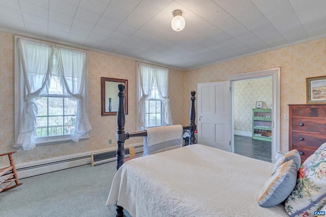 bedroom featuring baseboard heating, crown molding, and light colored carpet