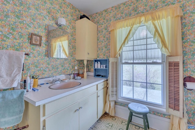 bathroom featuring tile flooring and vanity