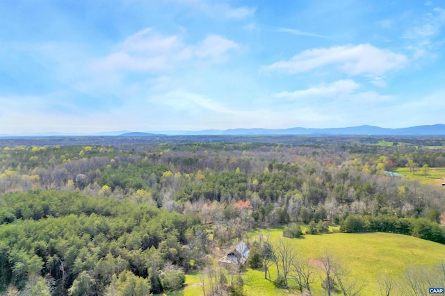 drone / aerial view featuring a mountain view