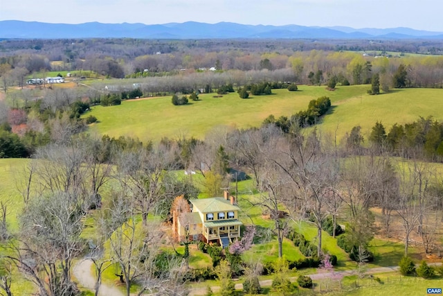 aerial view featuring a rural view and a mountain view